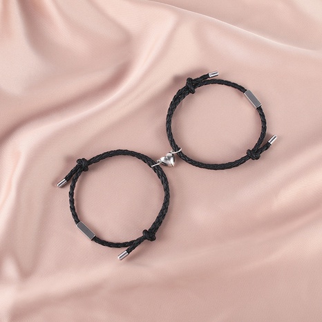 fashion PU rope heart-shaped magnet couple titanium steel bracelets's discount tags