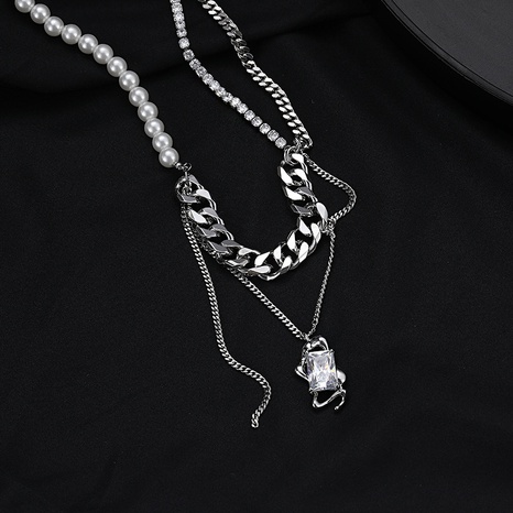 vintage pearl chain stitching zircon titanium steel necklace wholesale NHDAI666243's discount tags