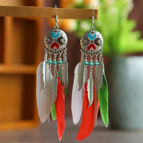 vintage exaggerated round feather long creative rice bead carved tassel earrings's discount tags