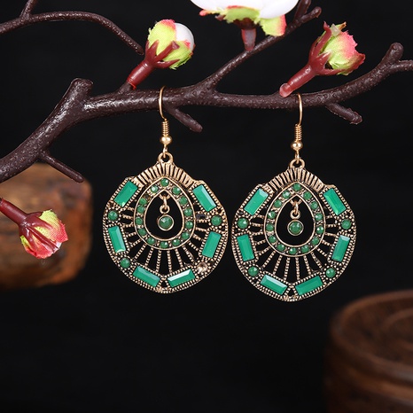 New Round Water Drops Hollow Retro Earrings Female Wholesale's discount tags