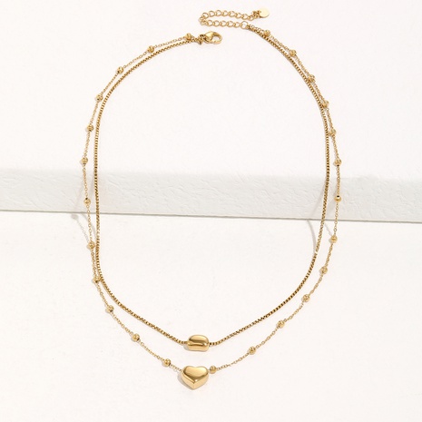 Titanium steel fashion peach heart pendant double bead necklace's discount tags
