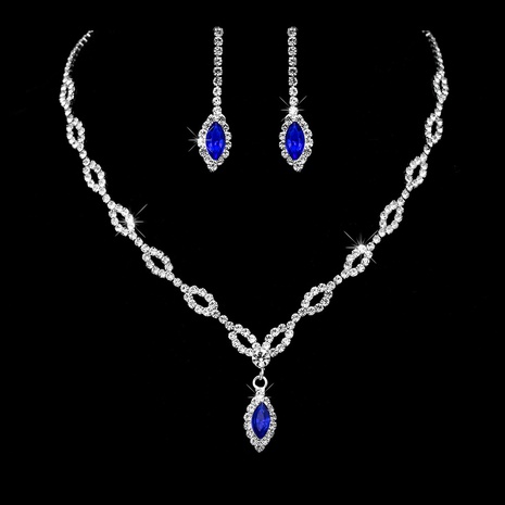 Ensemble de collier de boucles d'oreilles en œil de cheval bleu royal avec chaîne à griffes en cuivre simple's discount tags