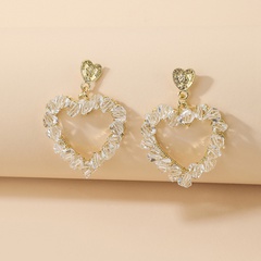 Boucles d'oreilles en alliage creux en forme de coeur en cristal incrusté de style coréen en gros