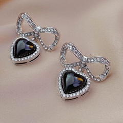 fashion inlaid rhinestone hollowed bow heart shaped alloy earrings wholesale