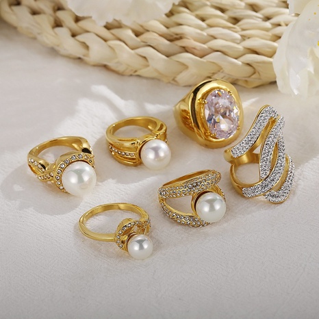 fashion pearl diamond exaggerated women's gold electroplating titanium steel ring's discount tags