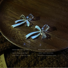 Fashion long crystal bow female alloy earrings