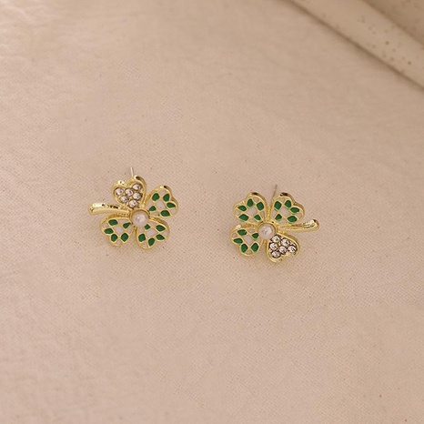 Checkerboard four-leaf flower alloy ear jewelry wholesale's discount tags