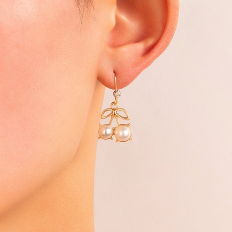 Korean style bow-shaped inlaide pearl zircon alloy earrings wholesale's discount tags