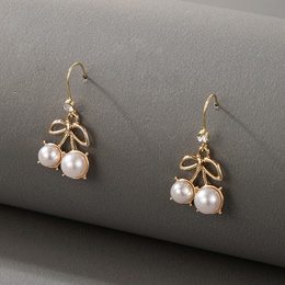 Korean style bowshaped inlaide pearl zircon alloy earrings wholesalepicture7