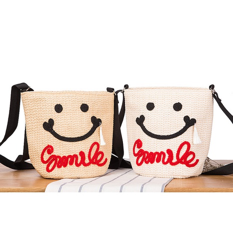 New Straw Bag Cute Sweet Smiley Tassel Beach Bag Woven Bucket Handbag 21*16cm NHSRH667748's discount tags