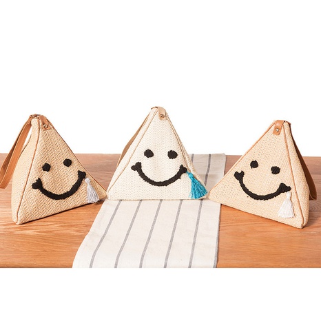 Triangle hand carry coin purse embroidered smiley face tassel woven straw bag 20*22cm NHSRH667749's discount tags