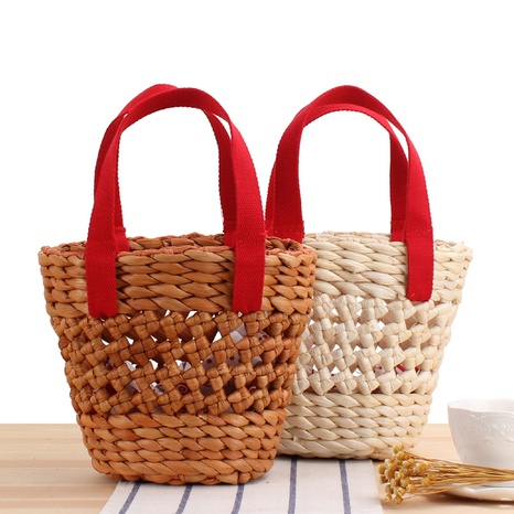 new portable solid color hollow children's straw woven basket bag 26*20*12cm NHSRH667766's discount tags