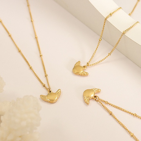 Collar de joyería de oro de 18 quilates con colgante geométrico de ala de acero de titanio simple al por mayor's discount tags