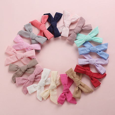 Korea solid color children's slub cotton bow girl cute fabric hair clip NHFNH668400's discount tags