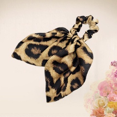 Anillo de pelo de bufanda flotante de cola de caballo de tela anudada con estampado de leopardo de moda simple al por mayor