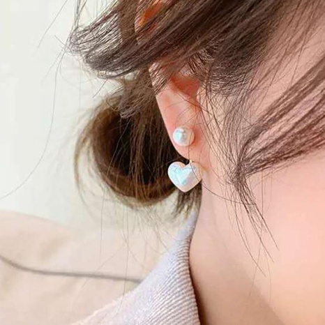 Boucles d'oreilles en alliage de perles en forme de coeur rétro simples et créatives's discount tags