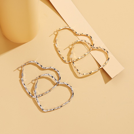 Fashion jewelry simple geometric copper heart shaped earrings female NHOA672943's discount tags