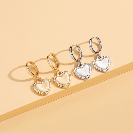 fashion simple heart-shaped copper ear buckle plated gold drop earrings's discount tags