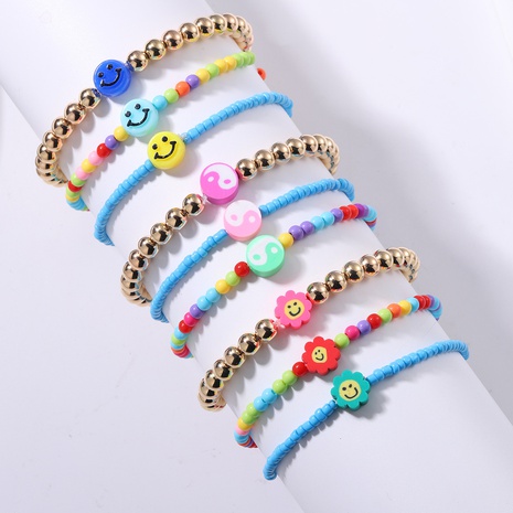 fashion gold bead smiley butterfly elastic bracelet set's discount tags