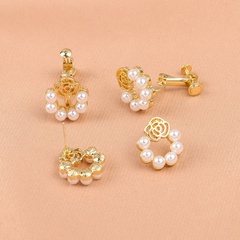 Pearl earrings new hollow flower alloy stud earrings