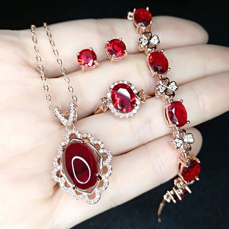 Wholesale Imitation Pigeon Blood Ruby Rose Gold Plated Garnet Jewelry Four-piece Set's discount tags