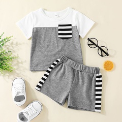 Camiseta de manga corta a juego con el color y pantalones cortos a rayas ropa para niños Conjunto de dos piezas