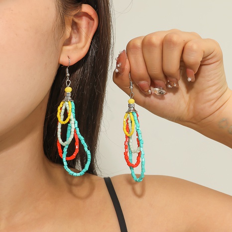 nouvelles boucles d'oreilles en perles creuses multicouches à la mode's discount tags