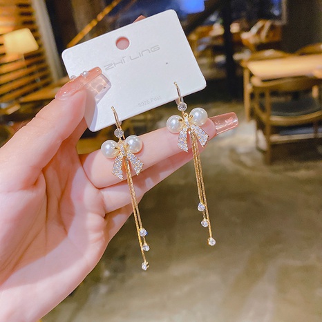 fashion copper bow pearl zircon tassel earrings's discount tags