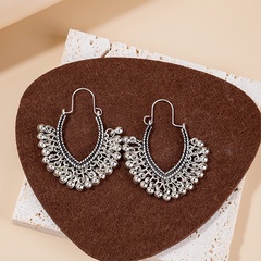 Fashion bohemian retro geometric oval U-shaped ethnic bell tassel alloy earrings