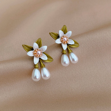 Fashion sweet pearl flower plant acrylic earrings's discount tags