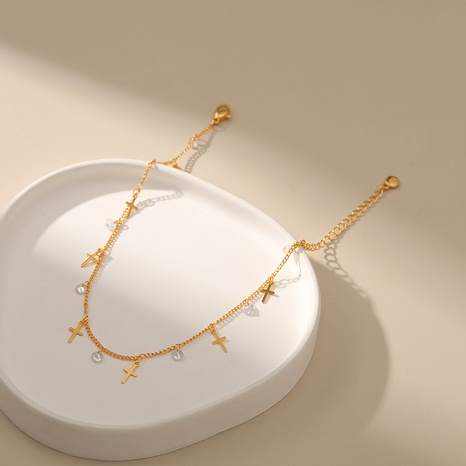 tobillera cruzada de circón con incrustaciones chapada en oro de 18 quilates de cobre de moda's discount tags