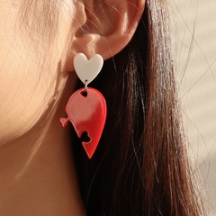 Fashion jewelry three-dimensional asymmetric heart-shaped alloy earrings