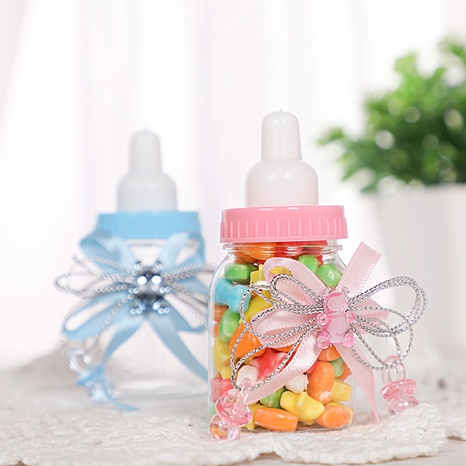 Linda botella de leche creativa de estilo europeo, caja de plástico transparente para dulces de boda, caja de azúcar para embalaje de regalo de cumpleaños para baby shower's discount tags