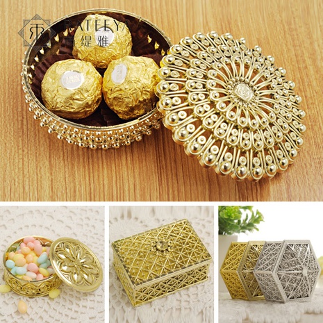 Factory direct supply creative candy box personality hollow gold-plated silver-plated aromatherapy box wedding candy box storage box's discount tags