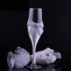 Suministros de boda occidental Copa de cristal creativa Encaje Pareja Copa de vino Caja de regalo Juego de copas de champán al por mayor