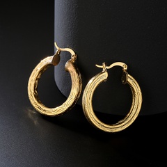 Runde, geometrische, verkupferte Ohrringe aus 18 Karat Gold mit modischem Muster