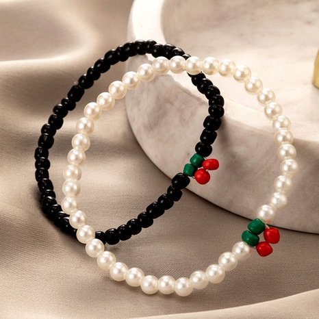 ethnic style pearl color beaded cherry couple bracelet set's discount tags