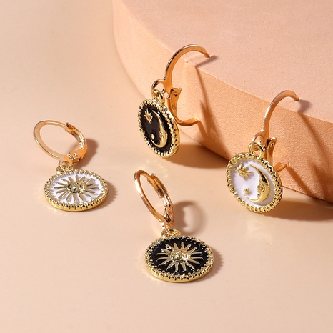 Fashion sun god moon pattern metal earrings's discount tags