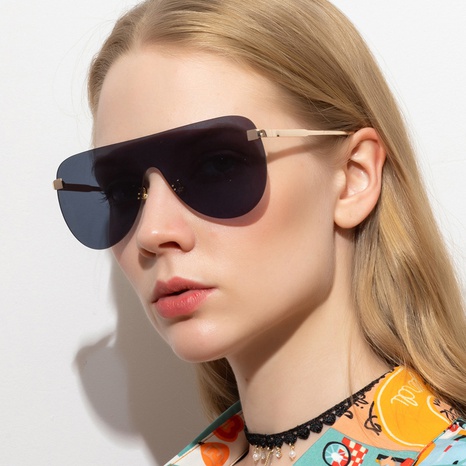 Nouvelles lunettes de soleil monobloc rétro pour femmes à grande monture's discount tags