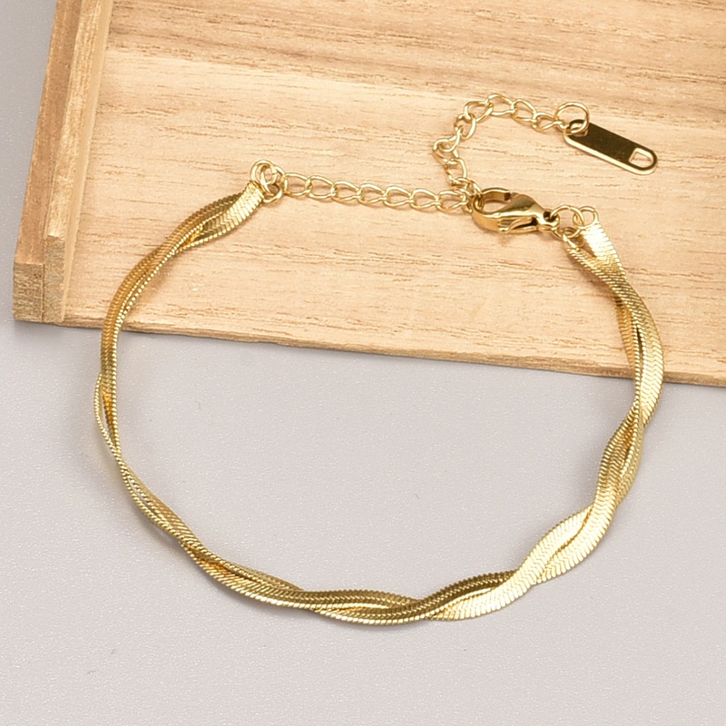 simple retro 18K gold double twist titanium steel bracelet female