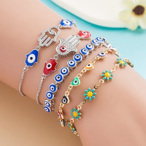 fashion creative devil's eye micro-set diamond heart floral copper bracelet's discount tags