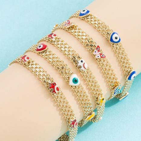 pulsera de cadena de malla chapada en oro real de cobre de ojo de diablo de moda's discount tags