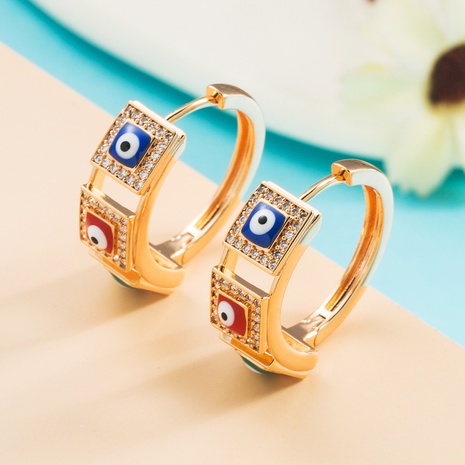 Fashion Copper Plated Gold Micro Inlaid Zircon Devil's Eyes Hip Hop Earrings's discount tags