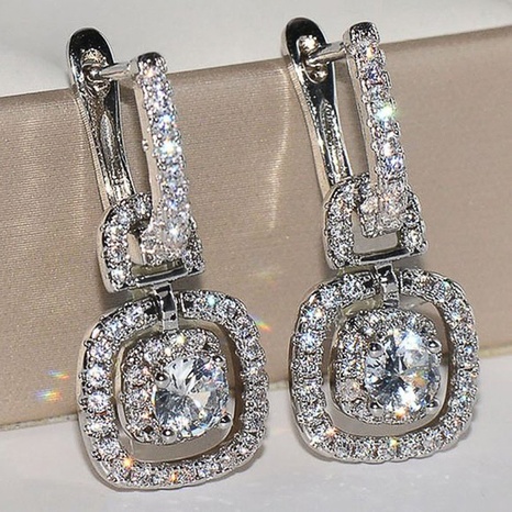 Mode Damen Glänzende Zirkon Ohrringe Kupfer Weißes Gold Überzogen Großhandel's discount tags