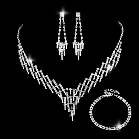 Nueva moda novia collar pendiente pulsera tres piezas conjunto de diamantes de imitación's discount tags