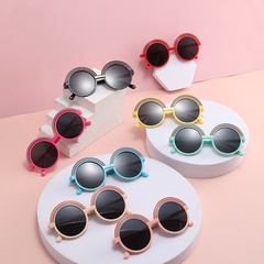 Modische Kindersonnenbrille mit rundem, buntem Rahmen