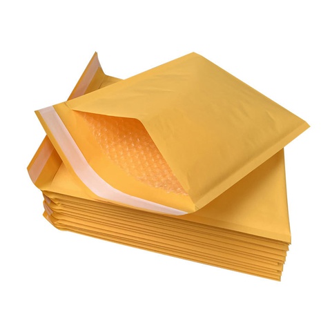 Bolsa de embalaje de ropa de papel Kraft amarillo Bolsa De sobre engrosada's discount tags