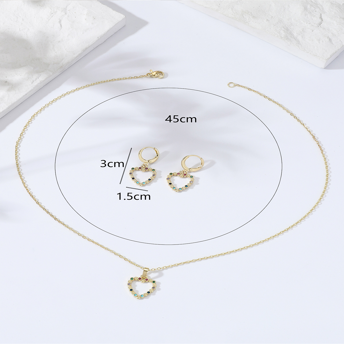 2022 Popular Simple Temperamental AllMatch Fashion Hollowed Heart ShapeShaped Inlaid Zircon Copper Plating m Gold Necklace Earrings Setpicture3