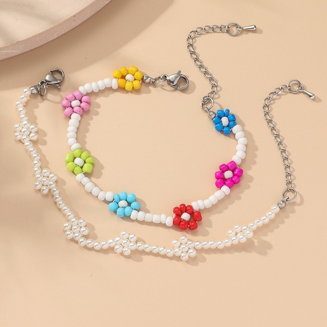 Hand-Woven Colorful Bohemian Vacation Flower Beaded Bracelet Two-Piece Set's discount tags