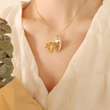Moda Retro Flip en forma de corazón colgante collar plateado 18K oro titanio acero's discount tags